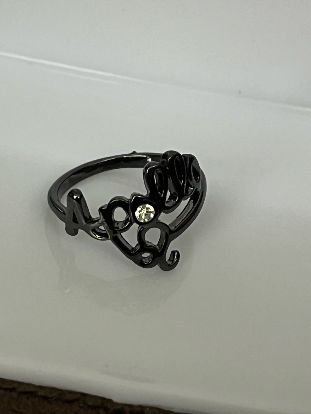 Black 'Apollo' Script Ring with Clear Stone